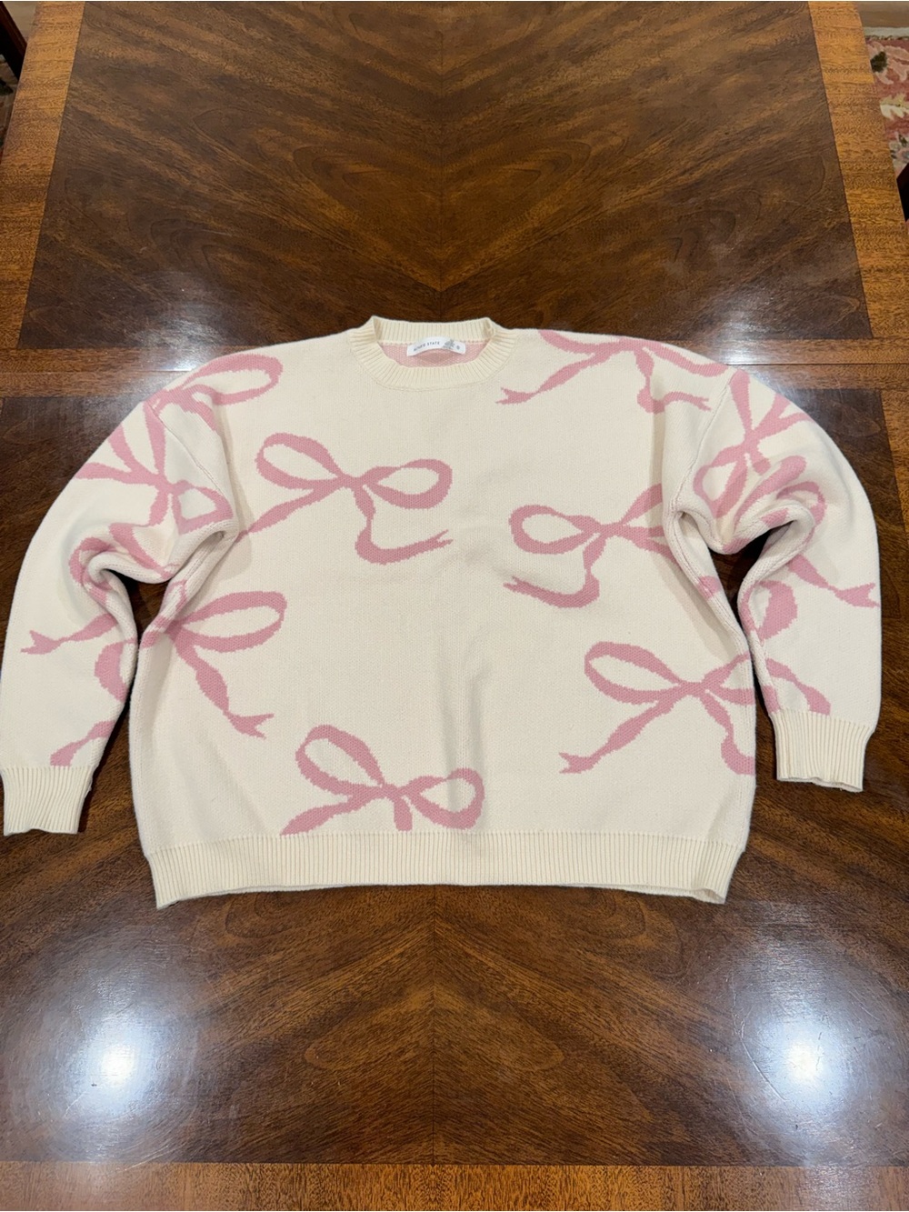 Altar’d State Cream Oversize Sweater with Pink Bow Pattern, size S
